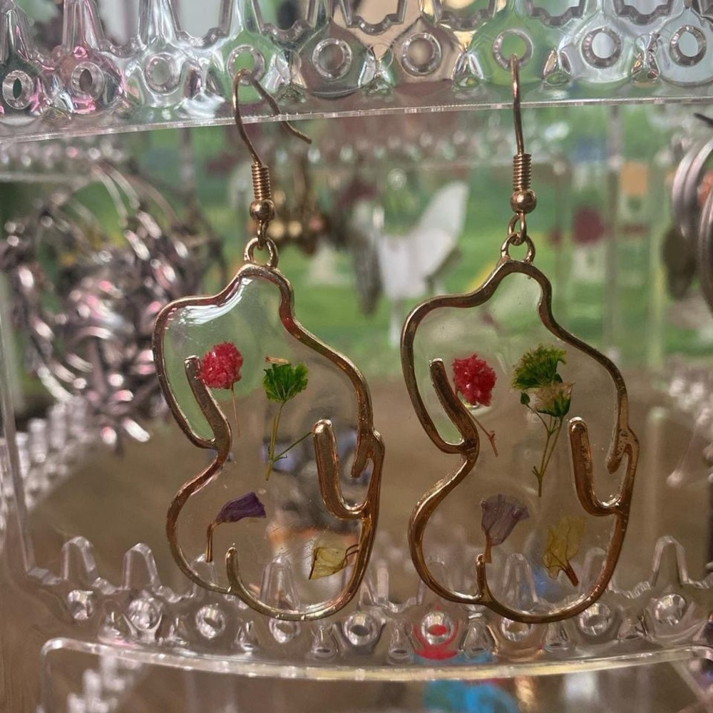 women's body floral earrings